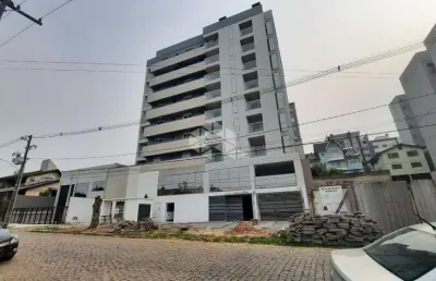 Apartamento com 3 dormitórios: 1 suíte, 2 banheiros, sacada , churrasqueira, 107m2, elevador, 2 vagas de garagem , perto do shopping
