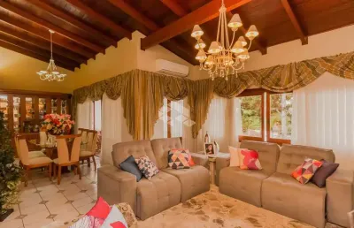 Casa à venda no bairro partenon com 4 dormitórios (2 suítes)