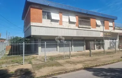 Excelente prédio com amplo apartamento com 3 dormitórios, suíte no segundo andar com garagem e 3 lojas grandes no térreo em avenida no bairro sarandi
