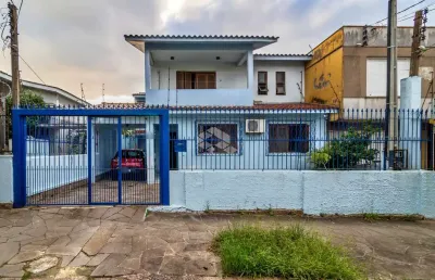 Casa com 3 quartos à venda na Rua Coronel Jaime da Costa Pereira, 318, Partenon, Porto Alegre