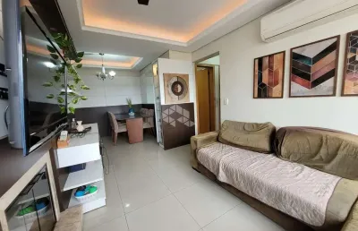 Apartamento  03 dormitórios, sendo 1 suíte, semimobiliado, lareira e churrasqueira a uma quadra da assis brasil