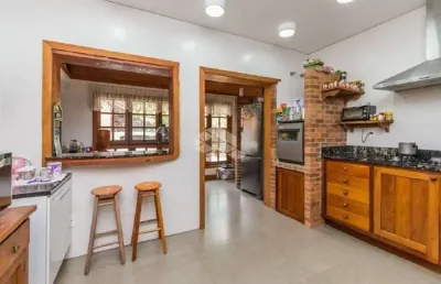 Casa com 600m², 4 dormitórios, 1 suíte, 8 vagas, no bairro ipanema em porto alegre