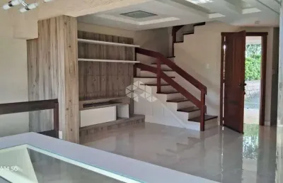 Casa em condomínio com 3 dormitórios, sendo 1 suíte, 4 banheiros, cozinha, amplo living, vaga para 2 carros no bairro vila conceição