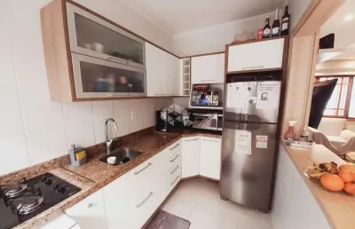 Casa a venda em condomínio com 3 dormitórios, suíte e espaço gourmet - zona sul de porto alegre.
