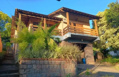 Casa com 3 quartos à venda na Avenida Vicente Monteggia, 2486, Cavalhada, Porto Alegre
