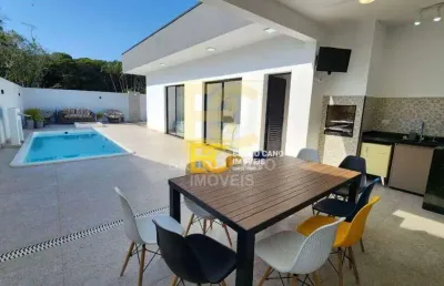 Casa térrea moderna com piscina em condomínio  - residencial jardim são luís - peruíbe/sp