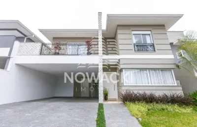 Casa em condominio com 4 suites e 4 vagas em santa felicidade