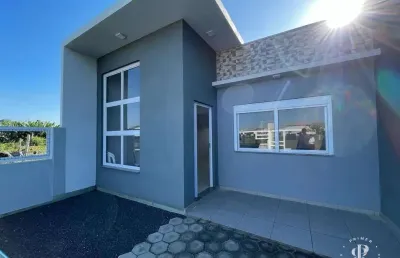 Casa moderna 2 dormitórios, 1 suíte - bairro centro na praia do imbé/rs.