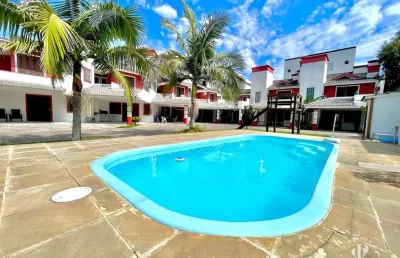 Sobrado com 3 suítes a 3 quadras do mar no centro em tramandaí/rs