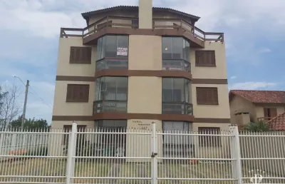 Apartamento duplex com 2 dormitórios, sendo 1 suíte próximo a praia em tramandaí