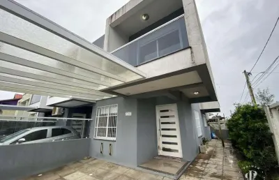 Duplex geminado de esquina no bairro zona nova em tramandaí