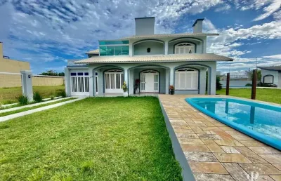 Casa com 3 quartos à venda na Avenida Oswaldo Bastos, 1197, Zona Nova, Tramandaí