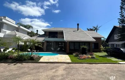 Casa em condomínio fechado com 3 quartos à venda na Avenida Paraguaçu, 2343, Courhasa, Imbé