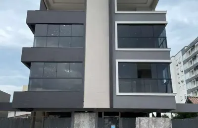 Apartamento mobiliado e decorado 2 dormitórios no centro de tramandaí.