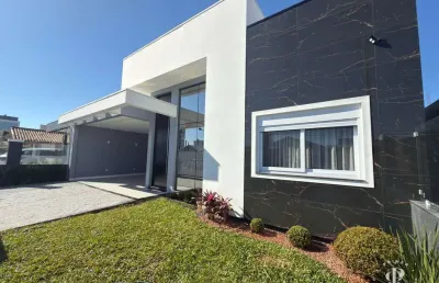 Casa de alto padrão com 3 dormitórios no centro de tramandaí
