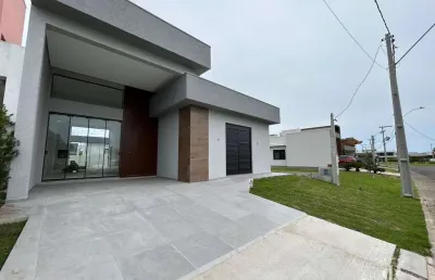 Casa de 4 dormitórios em condomínio exclusivo em tramandaí