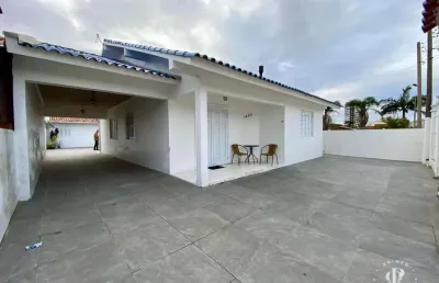 Casa térrea 3 dormitórios próximo ao supermercado nacional em tramandaí/rs.