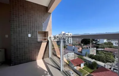 Apartamento 2 dormitórios c/suíte, sacada e churrasqueira