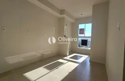 Apartamento novo com 2 dormitórios, garagem e sacada com churrasqueira em camobi
