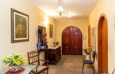 Lindo sobrado com  piscina, 4 suítes, 4  vagas de garagem