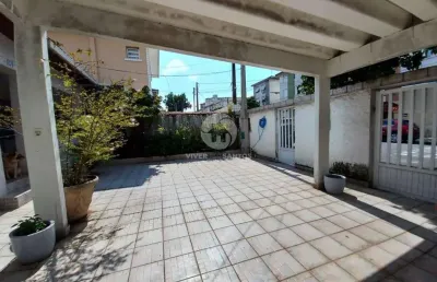 Casa isolada com 3 quartos no bairro da aparecida-santos
