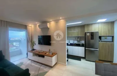 Excelente apartamento de 2 dormitórios, prédio com lazer na vila valença em são vicente.