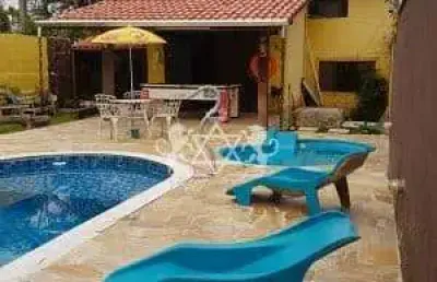 Casa à venda vista mar, 04 dormitórios , piscina, espaço gourmet com churrasqueira, praia das palme