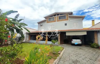 Sobrado à venda, 4 suítes, mezanino, 450m² total, jardim aruan, caraguatatuba, litoral norte de são