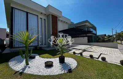 Sobrado à venda em condomínio (alto padrão) com 4 suítes/ área de lazer completa (churrasqueira, sa