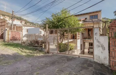 Casa com 5 quartos à venda na Rua Patrimonio, 119, Glória, Porto Alegre