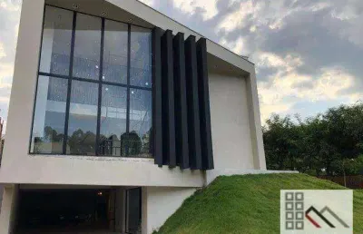 Casa em condomínio 4 dorms (530m²), 4 suítes, 6 vagas. conheça essa casa incrível