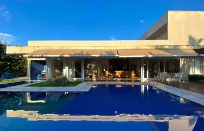 Casa a venda com quatro suites no condominio damha 1