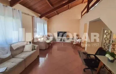 Casa térrea com 3 dormitórios ( sendo 2 suítes) e 3 vagas