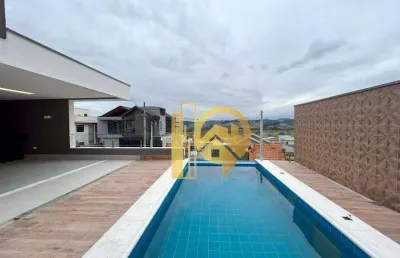 Casa 4 dormitórios à venda 290m² condomínio jaguary sjcampos/sp