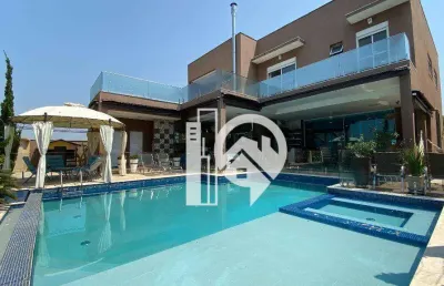 Casa de luxo mobiliada com 4 suítes à venda, 600 m² de alto luxo no condomínio reserva do paratehy - sjcampos/sp