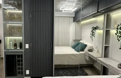 O mais lindo flat mobiliado a venda em goiania no predio mais moderno e tecnologico, com piscina de borda infinita no rooftop, possibilidade de renda faixa de 6 mil mes