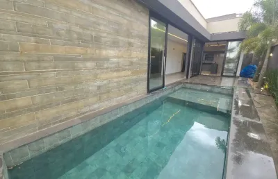 Casa terrea 3 suítes com home theater condominio para locaçao ou venda jd barcelona