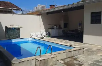 Sobrado mais edicula isolado com piscina 4 dormitórios suites 5 banheiro 4 vagas a 250 metros da praia no balneário maracanã em praia grande - sp.