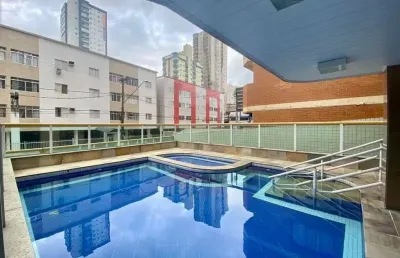 Apartamento de 2 quartos com suíte vista mar e vaga na garagem em praia grande-sp, bairro tupi: confira essa oportunidade!