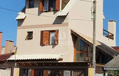 Casa com 3 quartos à venda na rua claudio da silva pinto, 221, espírito santo, porto alegre por r$ 900.000