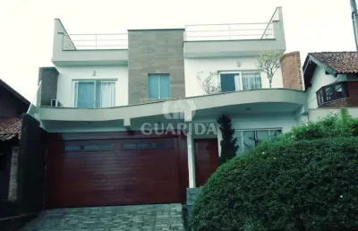 Casa em condomínio fechado com 3 quartos à venda na rua professor antônio josé remião, 15, espírito santo, porto alegre por r$ 1.450.000
