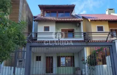 Casa com 6 quartos à venda na rua claudio da silva pinto, 34, espírito santo, porto alegre por r$ 1.050.000