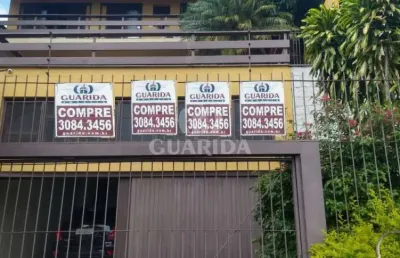 Casa com 3 quartos à venda na rua coronel ruy da cunha paim, 35, nonoai, porto alegre por r$ 900.000