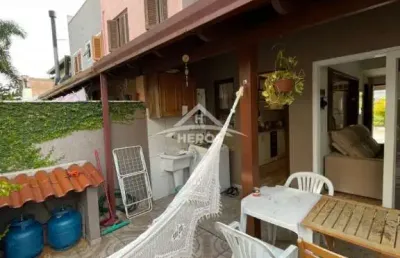 Casa com 3 quartos à venda na rua pau brasil, 728, hípica, porto alegre por r$ 630.000