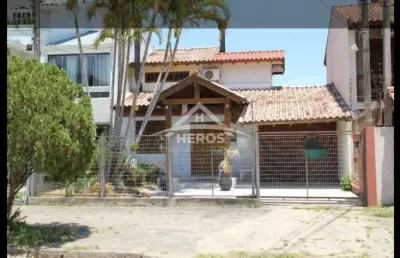 Casa com 4 quartos à venda na rua engenheiro otacílio oliveira, 207, ipanema, porto alegre por r$ 680.000