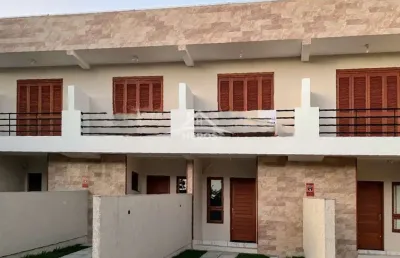Casa com 2 quartos à venda na rua helio felix frey, 132, guarujá, porto alegre por r$ 360.000