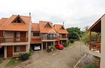 Casa em condomínio fechado com 3 quartos à venda na avenida orleaes, 105, guarujá, porto alegre por r$ 645.000