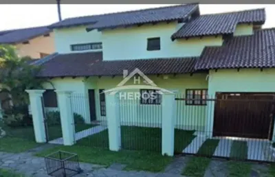 Casa com 4 quartos à venda na rua adão pinheiro da silva, 320, ipanema, porto alegre por r$ 980.000