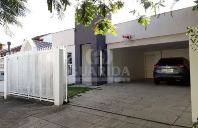 Casa com 3 quartos à venda na rua osmar amaro de freitas, 110, jardim itu sabará, porto alegre por r$ 790.000