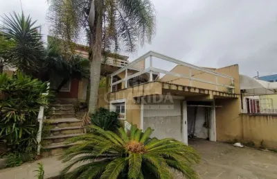 Casa com 4 quartos à venda na avenida celestino bertolucci, 75, aberta dos morros, porto alegre por r$ 1.100.000
